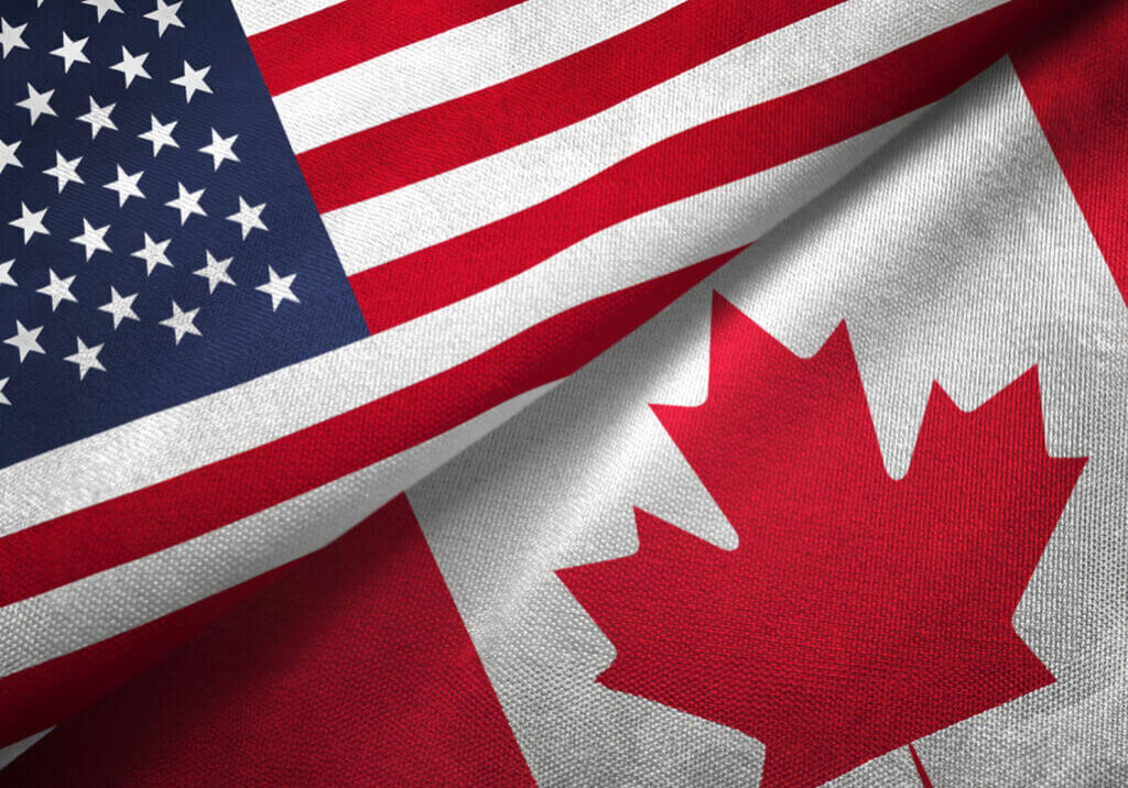 US flag and Canadian flag